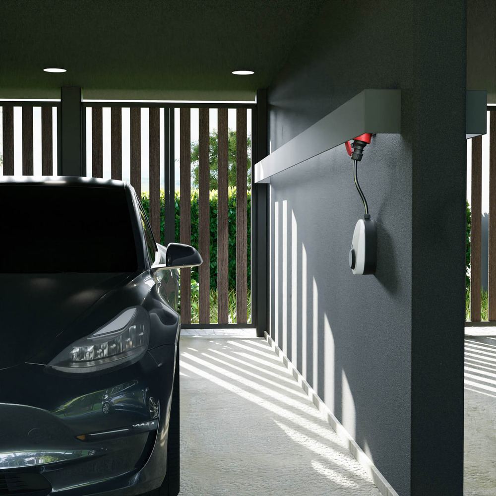 Mobile wallbox go-e Charger Gemini flex 22 kW next to Tesla